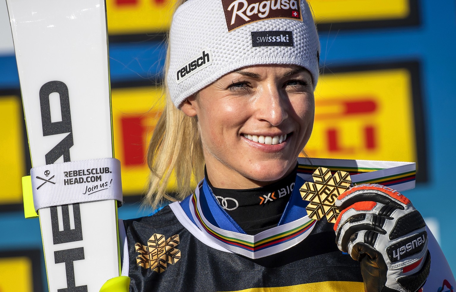 epa09004373 Lara Gut-Behrami of Switzerland poses with her gold medal on the podium after winning the women&#039;s Super G race of the 2021 FIS Alpine Skiing World Championships in Cortina d&#039;Ampe ...