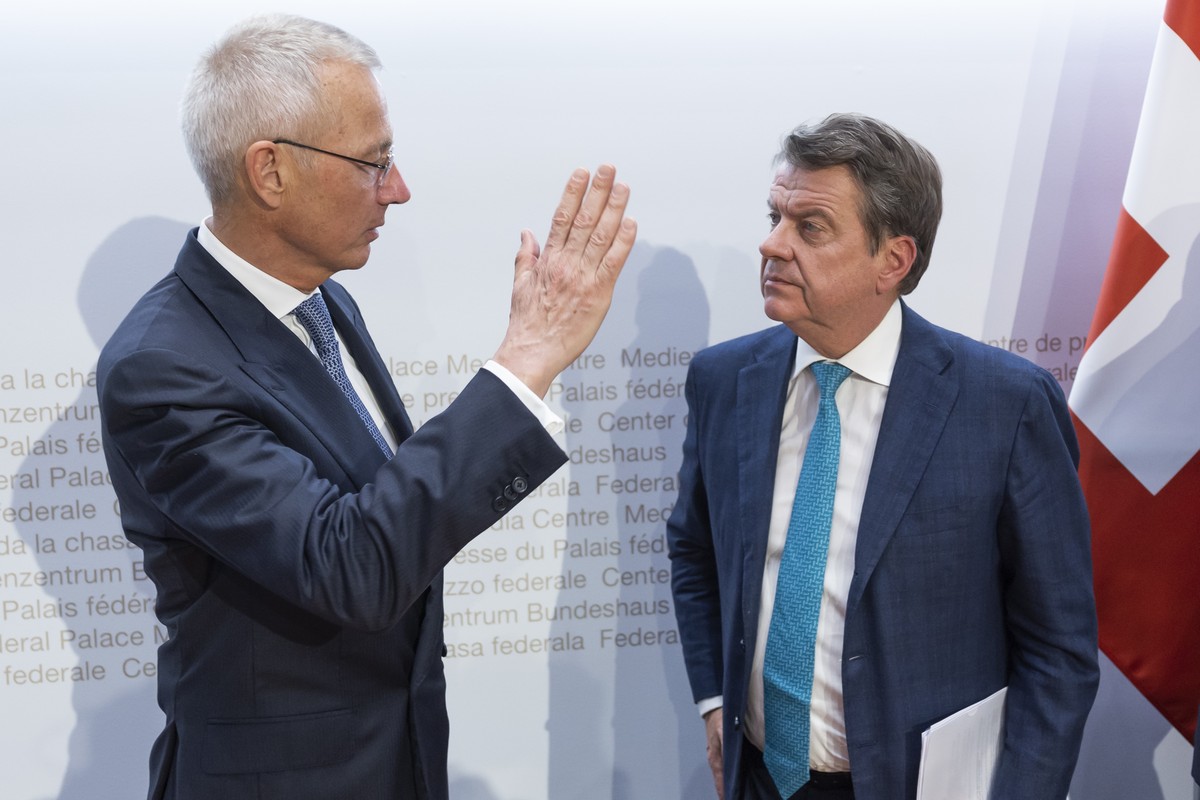 Axel Lehmann, Chairman Credit Suisse, left, and Colm Kelleher, Chairman UBS, at the end of a press conference, on Sunday, 19 March 2023 in Bern. Switzerland's largest bank UBS agreed to take over ...