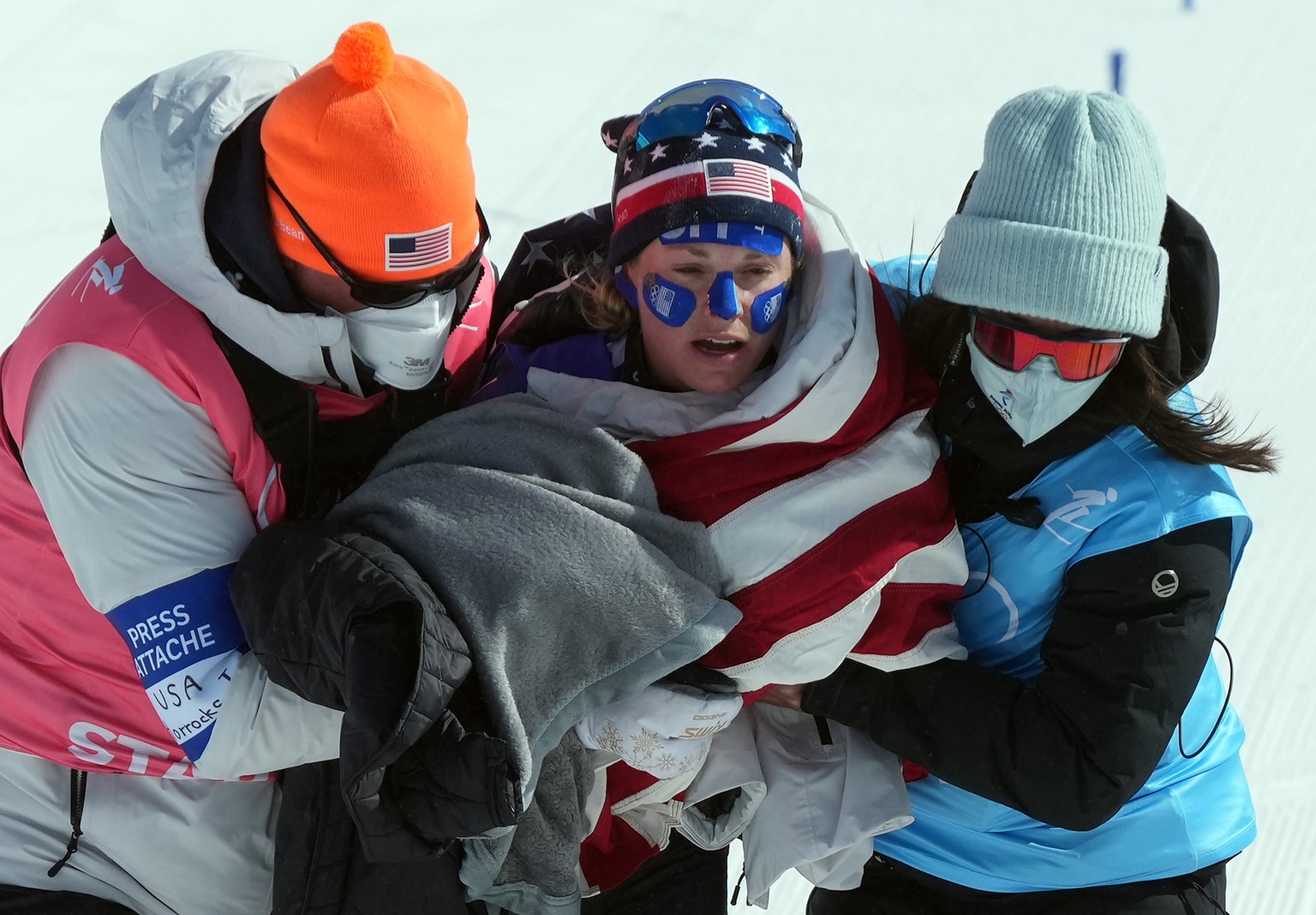epa09773649 Jessie Diggins of the USA after placing second in the Women's 30km Mass Start race at the Zhangjiakou National Cross-Country Skiing Centre at the Beijing 2022 Olympic Games, Zhangjiak ...