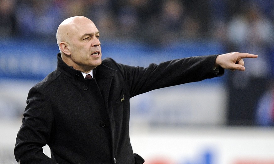 FILE - In this March 12, 2010 file photo, Stuttgart's head coach Christian Gross reacts during the German first division Bundesliga soccer match between FC Schalke 04 and VfB Stuttgart in Gelsenk ...