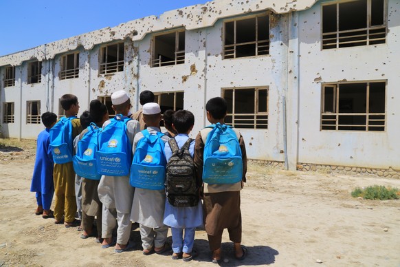 KEYPIX - epa12862016 Boys attend school after the start of the new academic year in Faryab, Afghanistan, 31 March 2026. Students, mostly boys, have returned to school with the start of the new academi ...