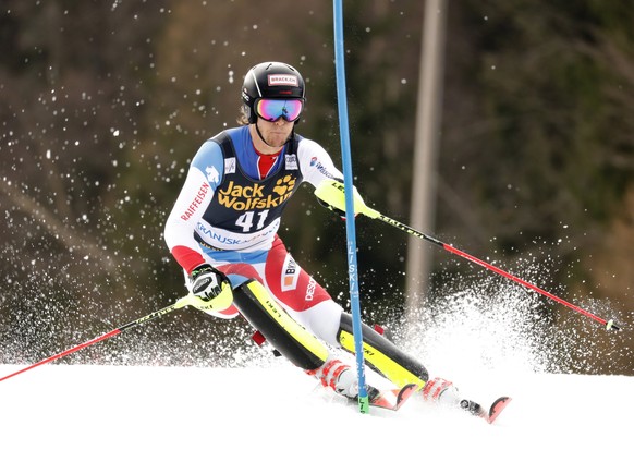 epa07426548 Sandro Simonet of Switzerland clears a gate during the first run of the Men&#039;s Slalom race at the FIS Alpine Skiing World Cup event in Kranjska Gora, Slovenia, 10 March 2019. EPA/ANTON ...