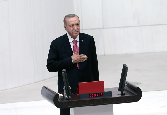 epa10670574 Turkish President Recep Tayyip Erdogan attends his swearing-in ceremony after being re-elected as Turkey's President, at the Turkish Grand National Assembly (TBMM) in Ankara, Turkey, 03...