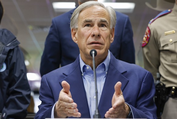 epa11072059 Texas Governor Greg Abbott gestures as he speaks during a briefing on the state&#039;s preparations ahead of the upcoming days of severe winter weather at the State Operations Center in Au ...