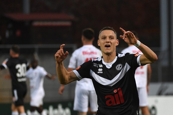 Lugano&#039;s player Zan Celar celebrates the 2-0 goal, during the Super League soccer match FC Lugano against FC Winterthur, at the Cornaredo stadium in Lugano, Sunday, November 13, 2022. (KEYSTONE/T ...