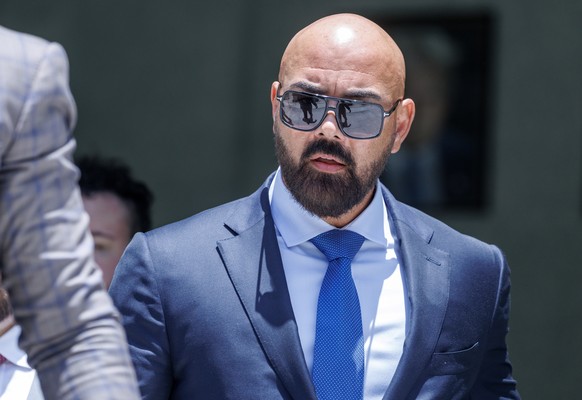 epa13123606 Social media influencers Andrew and Tristan Tate?s attorney, Joseph Daniel McBride, leaves the C. Clyde Atkins United States Courthouse in Miami, Florida, USA, 20 July 2026, where the brot ...
