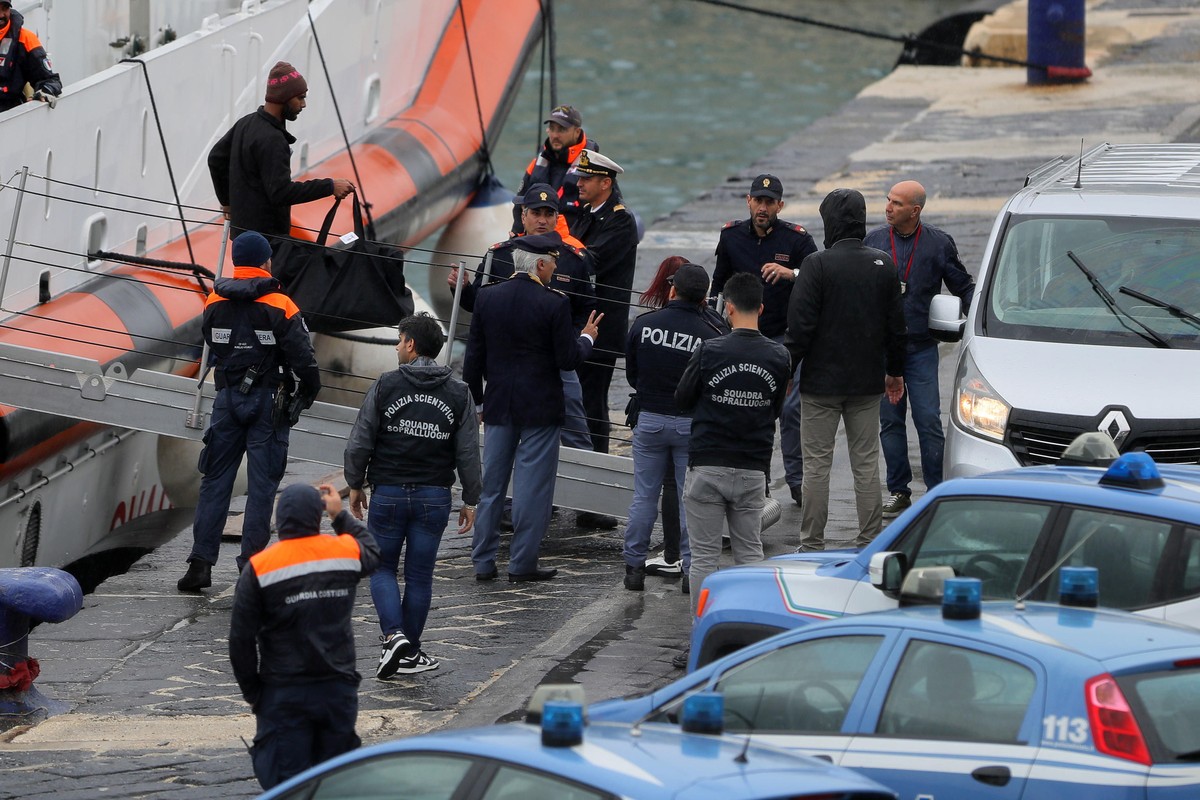 epa11668873 The Italian coast guard patrol boat arrives at the port of Bari carrying the 12 migrants from the Italian repatriation center in Gjader, for whom the return to Italy was ordered after the  ...