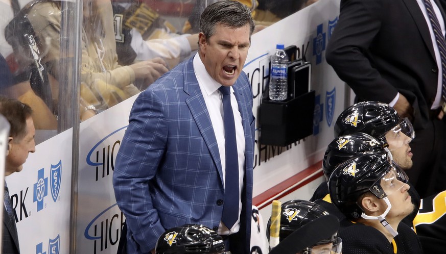 Pittsburgh Penguins head coach Mike Sullivan yells instructions during the third period of an NHL hockey game against the Philadelphia Flyers in Pittsburgh, Tuesday, Oct. 29, 2019. The Penguins won 7- ...