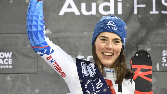 epa08128622 Winner Petra Vlhova of Slovakia celebrates on the podium after of the Women's Slalom night race at the FIS Alpine Skiing World Cup in Flachau, Austria, 14 January 2020. EPA/CHRISTIAN ...