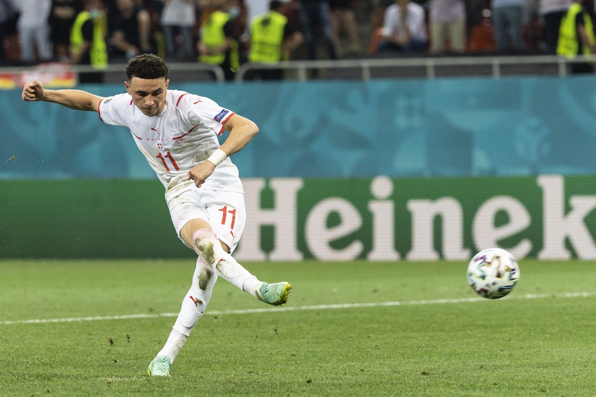 Switzerland's midfielder Ruben Vargas shoots his penalty during the Euro 2020 soccer tournament round of 16 match between France and Switzerland at the National Arena stadium, in Bucharest, Roman ...