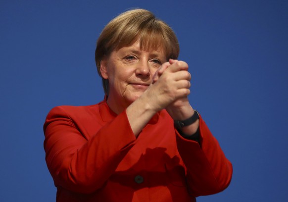 German Chancellor and leader of the conservative Christian Democratic Union party CDU Angela Merkel reacts after her speech at the CDU party convention in Essen, Germany, December 6, 2016. REUTERS/Kai ...