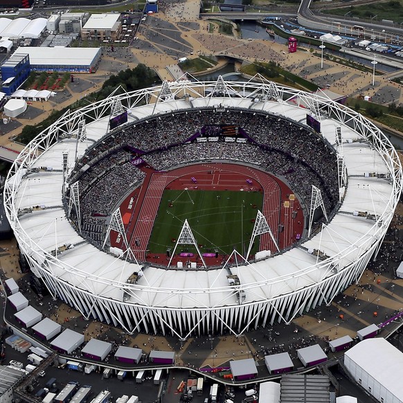 FILE - This Aug. 3, 2012, aerial file photo shows the Olympic Stadium at Olympic Park, in London. The mayor of London Wednesday Nov. 2, 2016 has ordered an investigation into the rising costs of conve ...