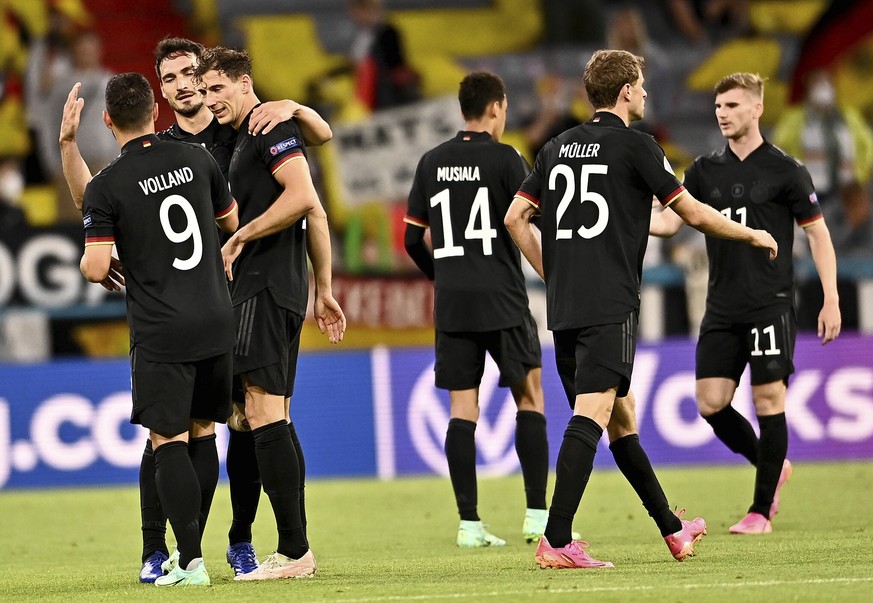 German players celebrate after the Euro 2020 soccer championship group F match between Germany and Hungary at the Allianz Arena in Munich, Germany,Wednesday, June 23, 2021. (Lukas Barth/Pool Photo via ...