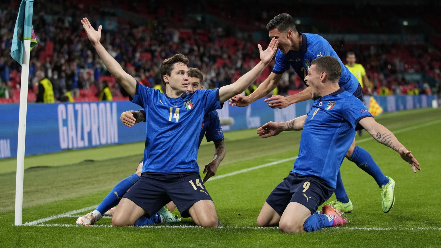 Italy&#039;s Federico Chiesa, left, celebrates with his teammates after scoring his side&#039;s opening goal during the Euro 2020 soccer championship round of 16 match between Italy and Austria at Wem ...