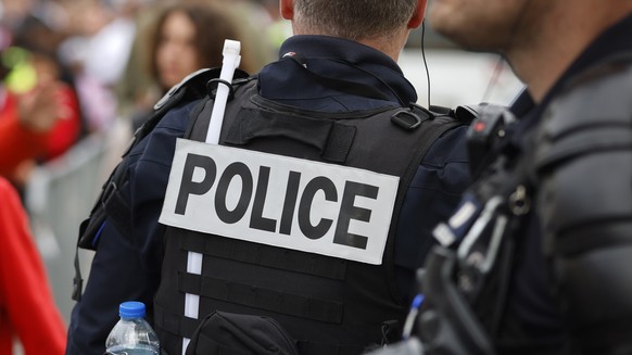 Police officers stand guard ahead the UEFA Nations League soccer match between France and Denmark at the Stade de France in Saint Denis near Paris, France, Friday, June 3, 2022. (AP Photo/Jean-Francoi ...
