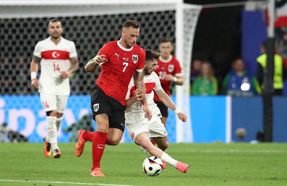 02.07.2024, xtgx, Fussball EM 2024 1/8 Finale, �sterreich - T�rkei emspor, v.l. Marko Arnautovic Oesterreich, Ismail Y�ksek T�rkei Tuerkei UEFA REGULATIONS PROHIBIT ANY USE OF PHOTOGRAPHS as IMAGE SEQ ...