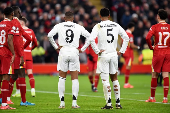 epa11744411 Jude Bellingham and Kylian Mbappe of Real Madrid look on during the UEFA Champions League match between Liverpool and Real Madrid in Liverpool, Britain, 27 November 2024. EPA/PETER POWELL