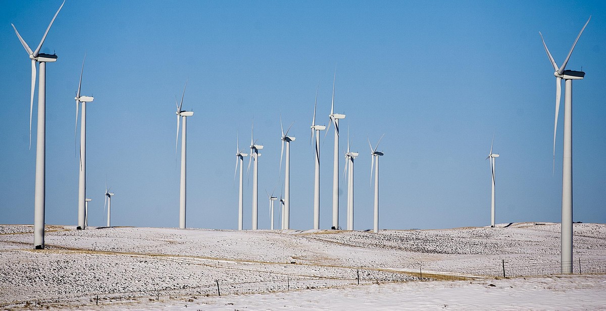 FILE - In this Nov. 2, 2011 file photo, Rocky Mountain Power's wind farm North of Glenrock, Wyo., captures energy. President Donald Trump's efforts to roll back coal and climate-change regul ...