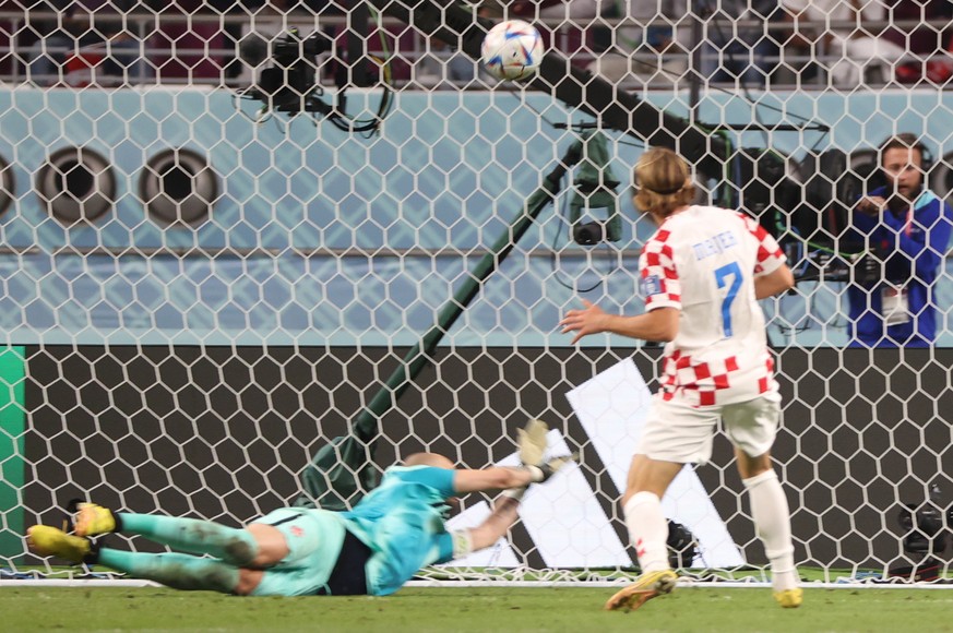 epa10333008 Lovro Majer of Croatia scores the 4-1 lead during the FIFA World Cup 2022 group F soccer match between Croatia and Canada at Khalifa International Stadium in Doha, Qatar, 27 November 2022. ...