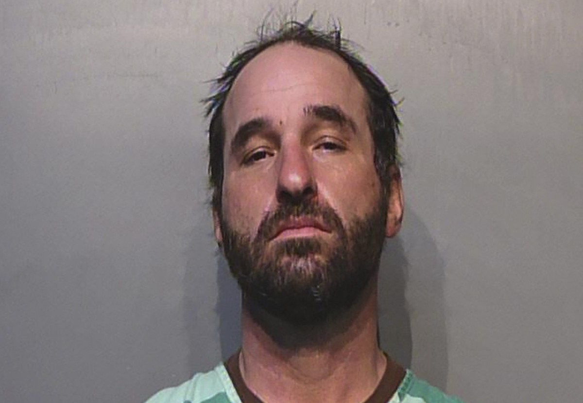 This photo provided by Polk County (Iowa) Jail shows Douglas Jensen. Authorities have arrested Jensen from Des Moines, Iowa, who allegedly took part in the riot at the U.S. Capitol building by support ...