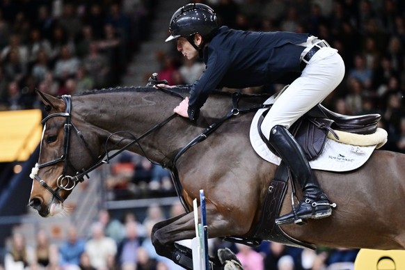 epa11918328 Switzerland Steve Guerdat on the horse Dynamix de Belheme during the FEI Jumping World Cup at the Gothenburg Horse Show in Scandinavium, in Gothenburg, Sweden, 23 Feburary 2025. EPA/Bjorn  ...