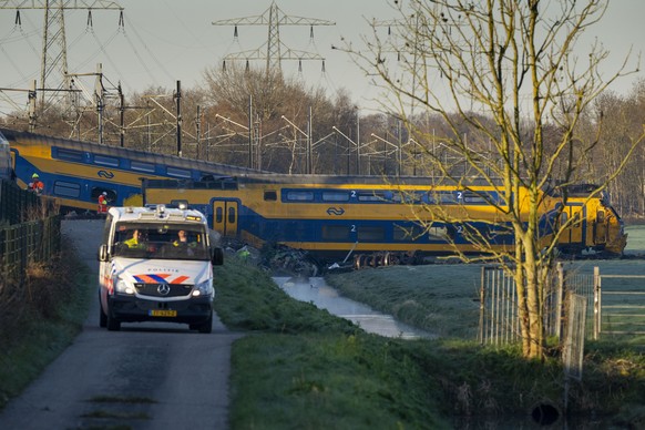 At least one person died and some 30 passengers were injured in the early hours when a train partially derailed, in Voorschoten, near The Hague, Tuesday April 4, 2023, sending at least one carriage in ...