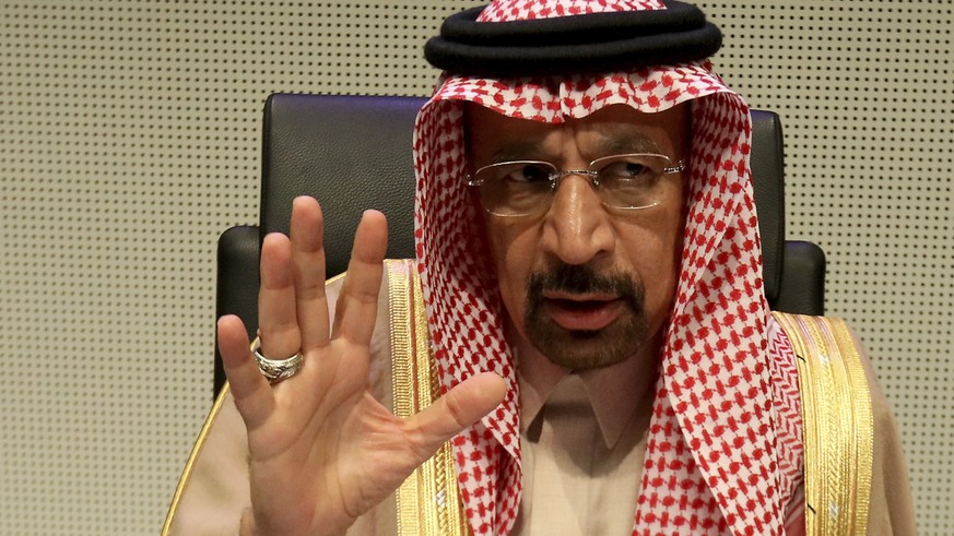 Khalid Al-Falih, Minister of Energy, Industry and Mineral Resources and President of the OPEC Conference of Saudi Arabia, speaks to journalists prior to the start of a meeting of the Organization of t ...