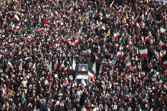 FILE - People gather in a rally to support Ayatollah Mojtaba Khamenei, the successor to his late father Ayatollah Ali Khamenei as supreme leader, in Tehran, Iran, March 9, 2026. (AP Photo/Vahid Salemi ...