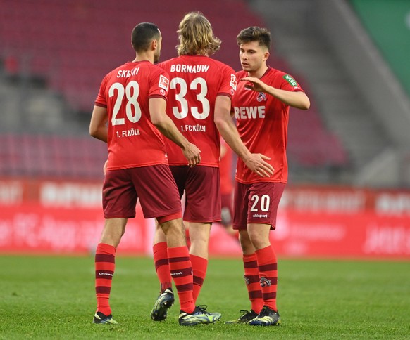 epa09148021 Cologne&#039;s players celebrate after winning the German Bundesliga soccer match between FC Koeln and RB Leipzig in Cologne, Germany, 20 April 2021. EPA/SASCHA STEINBACH / POOL CONDITIONS ...