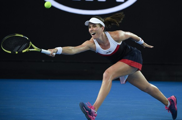 Britain&#039;s Johanna Konta makes a forehand return to Spain&#039;s Garbine Muguruza during their second round match at the Australian Open tennis championships in Melbourne, Australia, Friday, Jan.  ...