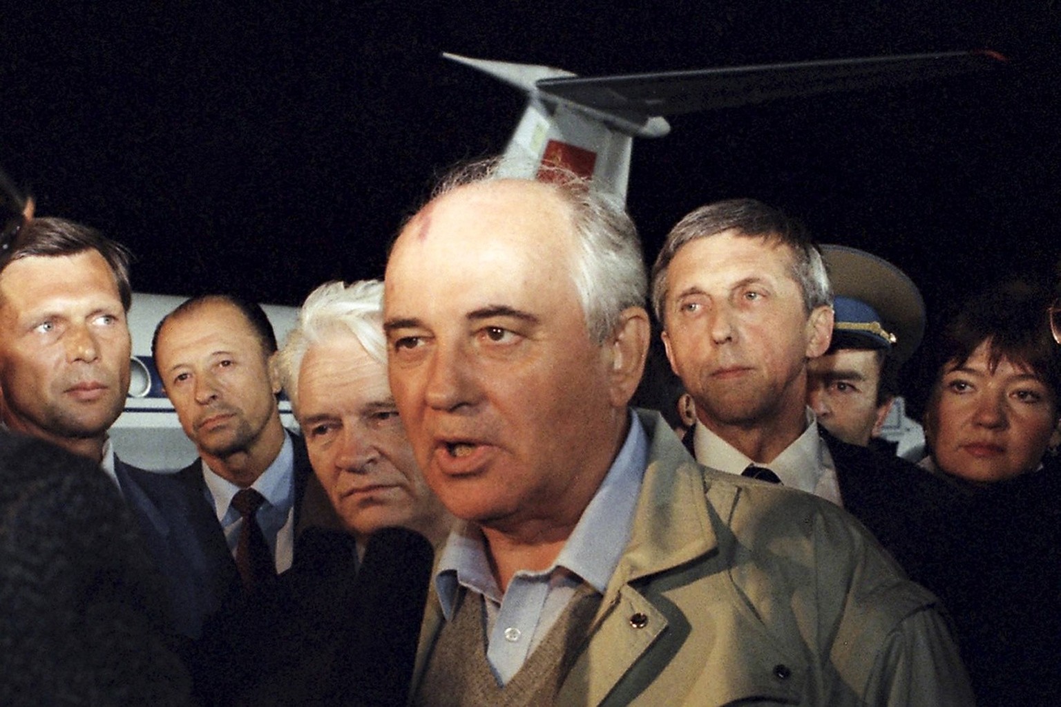 FILE - In this Thursday, Aug. 22, 1991 file photo, Soviet President Mikhail Gorbachev speaks to a Soviet TV newsman at Vnukovo airport outside Moscow, shortly after arriving from the Crimea after a th ...