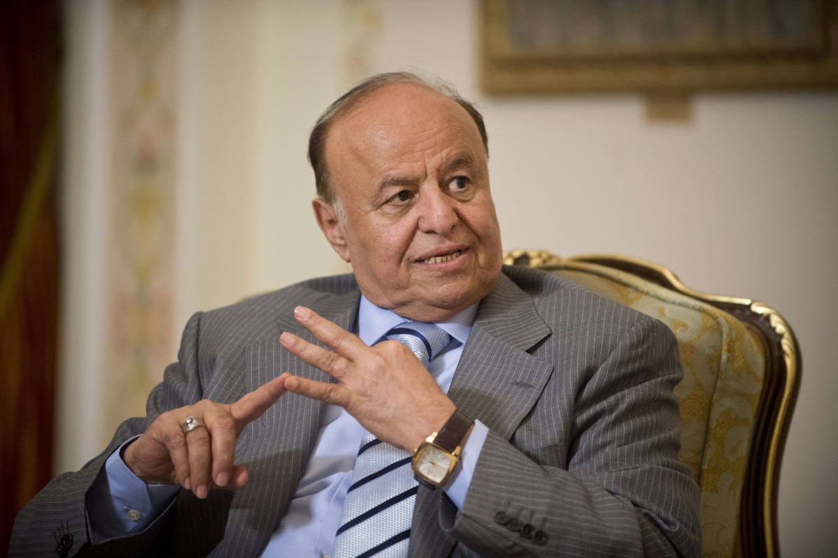 (FILES) - A file picture taken on April 2, 2013 shows then Yemeni President Abdrabuh Mansur Hadi speaking with his Russia's counterpart Vladimir Putin during their meeting in Putin's Novo-Og ...