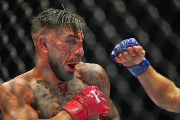 Ilia Toupruia, left, fights Justin Gaethje during UFC Freedom 250 on the South Lawn of the White House, Monday, June 15, 2026, in Washington. (AP Photo/Alex Brandon)
UFC Freedom 250 Trump