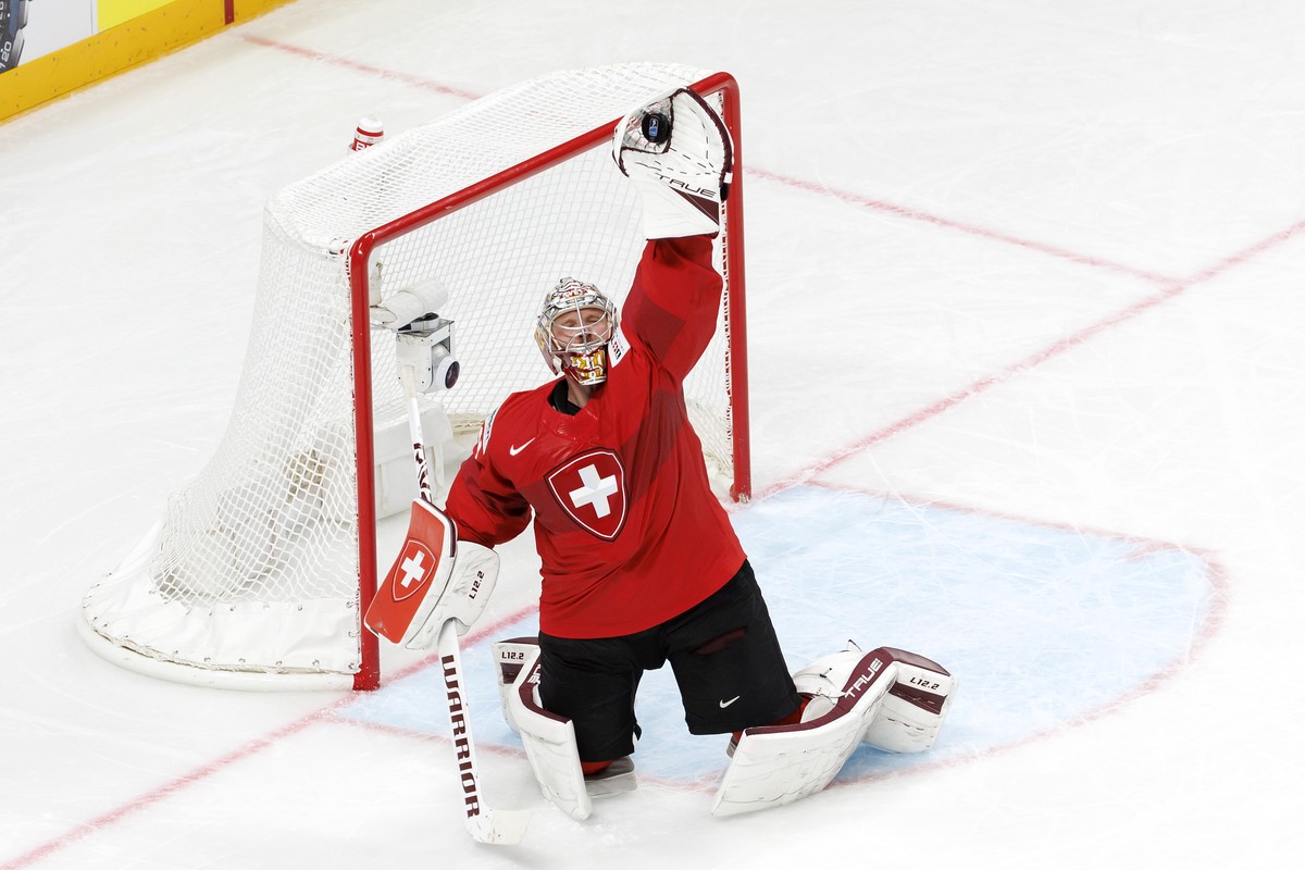 Switzerland's goaltender Robert Mayer blocks the puck, during the IIHF 2023 World Championship preliminary round group B game between Norway and Switzerland, at the Riga Arena, in Riga, Latvia, S ...