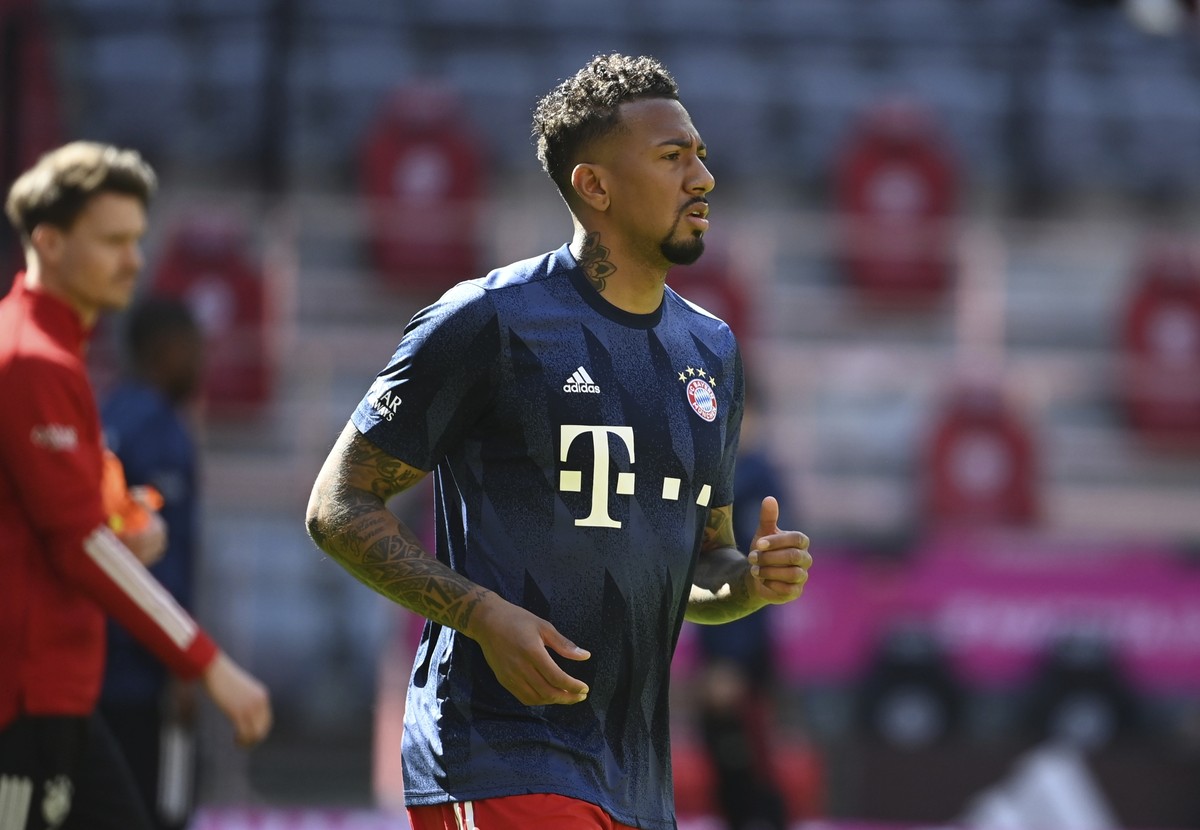 Bayern's Jerome Boateng warms up before the German Bundesliga soccer match between Bayern Munich and FC Union Berlin at Allianz Arena in Munich, Germany, Saturday, April 10, 2021.(Sven Hoppe/Pool ...