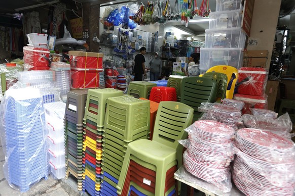 epa12154108 Plastics items are displayed for sale on a street in Hanoi, Vietnam, 04 June 2025. World Environment Day is celebrated annually on 05 June, aiming to raise awareness about environmental is ...