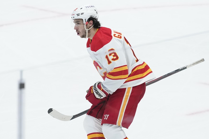 Calgary Flames left wing Johnny Gaudreau (13) celebrates his goal on a penalty shot in the third period of Game 4 of an NHL hockey Stanley Cup first-round playoff series against the Dallas Stars, Mond ...