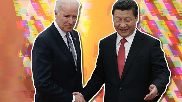 FILE - In this Dec. 4, 2013, file photo, Chinese President Xi Jinping, right, shakes hands with then U.S. Vice President Joe Biden as they pose for photos at the Great Hall of the People in Beijing. A ...