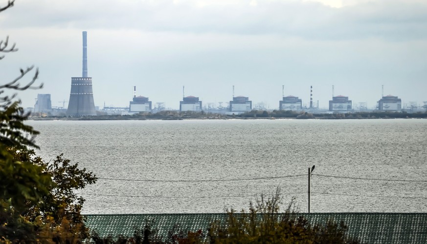 epa10271118 The Zaporizhzhia nuclear power plant (ZNPP) is seen from Nikopol, Ukraine, 28 October 2022. According to a statement by IAEA director general chief Grossi from 28 October 2022, engineers a ...