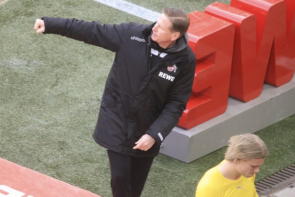 epa09086332 Cologne&#039;s head coach Markus Gisdol (L) and Dortmund&#039;s Erling Haaland (R) react after the German Bundesliga soccer match between FC Cologne and Borussia Dortmund in Cologne, Germa ...