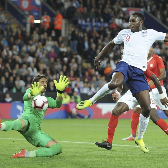 Switzerland goalkeeper Yann Sommer, left, and England&#039;s Danny Welbeck challenge for the ball during the International friendly soccer match between England and Switzerland at the King Power Stadi ...