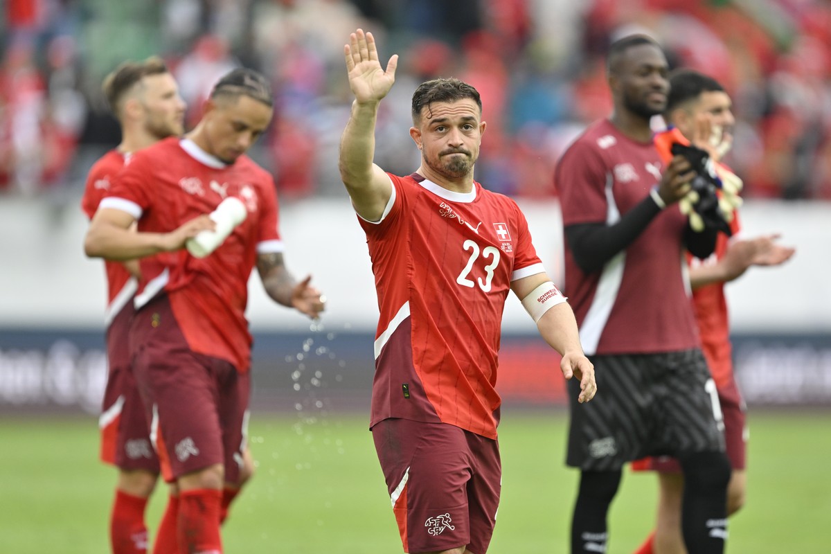 Switzerland's Xherdan Shaqiri and team react after an international friendly soccer match between Switzerland and Austria at the kybunpark stadium in St. Gallen, Switzerland, Saturday, June 8, 20 ...