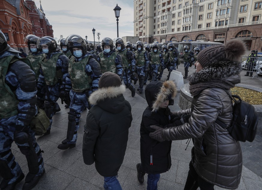 epa09805070 Russian policemen deployed prior to an unauthorized protest against the Russian military aggression in Ukraine, in downtown Moscow, Russia, 06 March 2022. Kremlin critic Alexei Navalny on  ...
