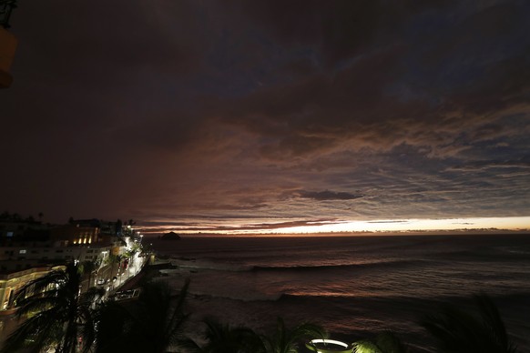 The sun sets, as Hurricane Willa makes landfall, in Mazatlan, Mexico, Tuesday, Oct. 23, 2018. Emergency officials said they evacuated more than 4,250 people in coastal towns and set up 58 shelters ahe ...