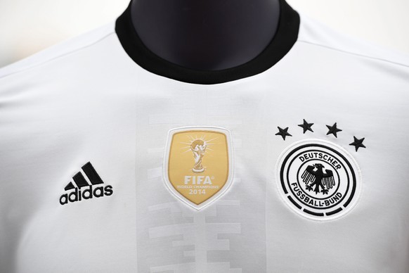 epa05379275 A display dummie dressed in the jersey of the German national soccer team is seen during a press conference about the sponsors agreement between the German Football Federation (DFB) and Ad ...