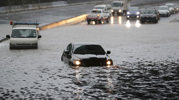 Vehicles are stranded by flood water in Auckland, Saturday, Jan 28, 2023. Record levels of rainfall pounded New Zealand&#039;s largest city, causing widespread disruption. (Dean Purcell/New Zealand He ...