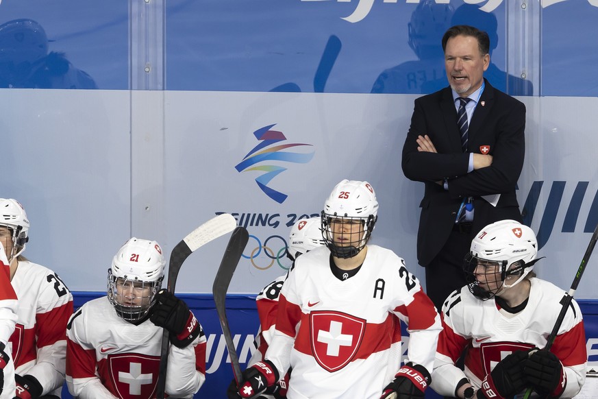 Colin Mueller, Head coach of Switzerland national ice hockey team, talks to his players, during the women&#039;s ice hockey quarterfinal game between Team ROC (Russia) and Switzerland at the Wukesong  ...