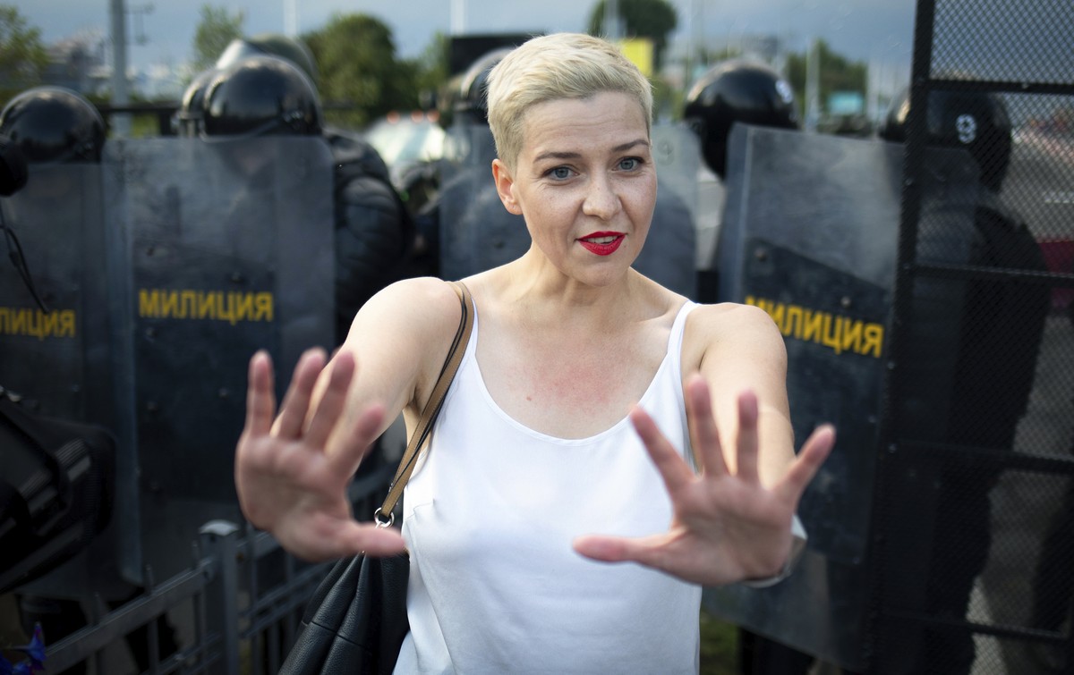Maria Kolesnikova, one of Belarus' opposition leaders, center, gestures during a rally in Minsk, Belarus, Sunday, Aug. 30, 2020. Tens of thousands of demonstrators have gathered in the capital of ...