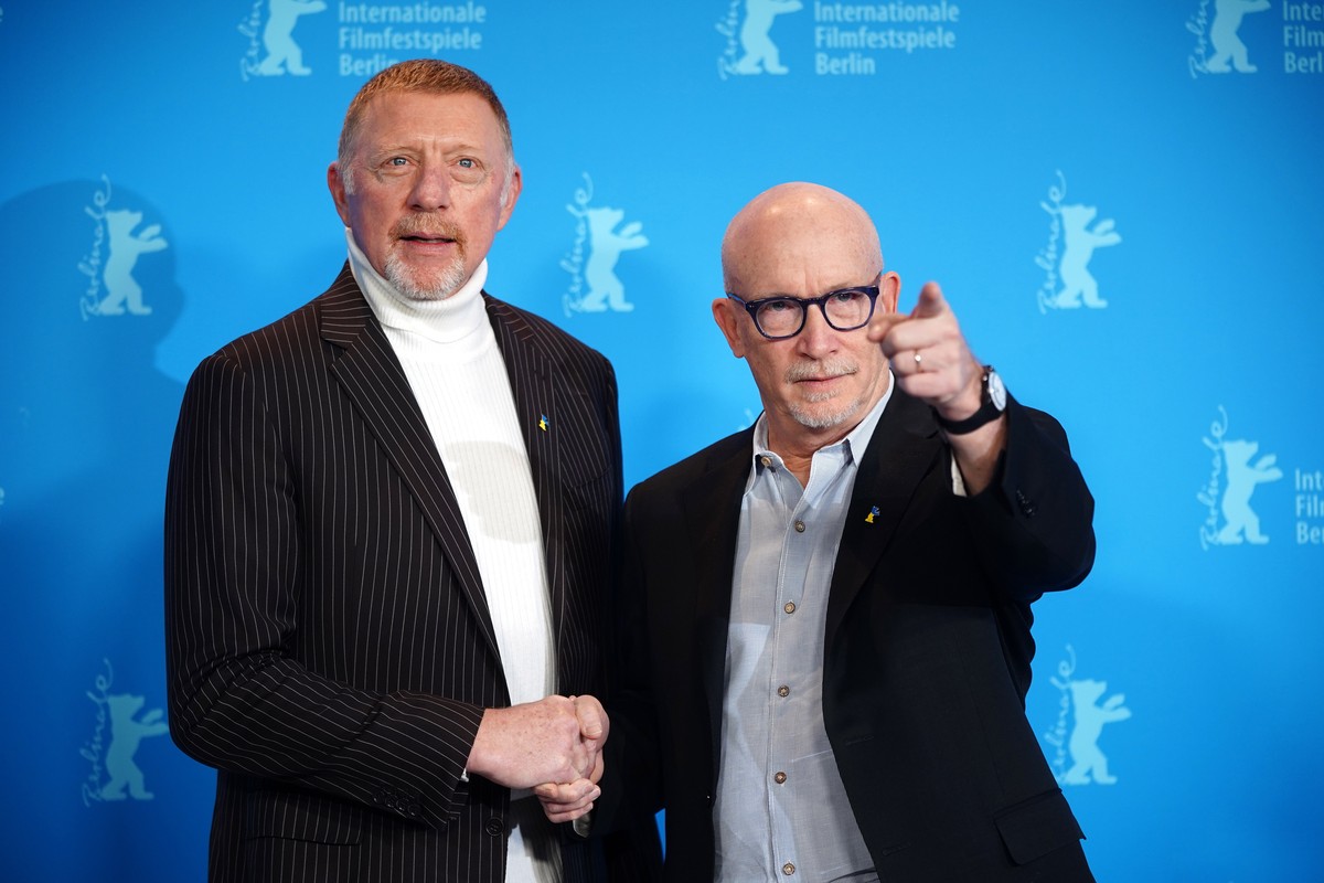 epa10476883 German former tennis player Boris Becker (L) and US filmmaker Alex Gibney pose at the photocall for the documentary film 'Boom! Boom! The World vs. Boris Becker' during the 73rd  ...