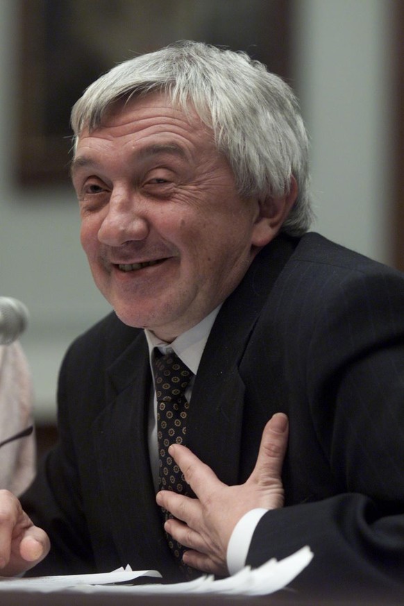 Yuri Shchekochikhin, a member of the Russian Duma, answers a question before the House Banking Committee Wednesday, Sept. 22, 1999, in Washington. The committe is looking into an alleged money-launder ...